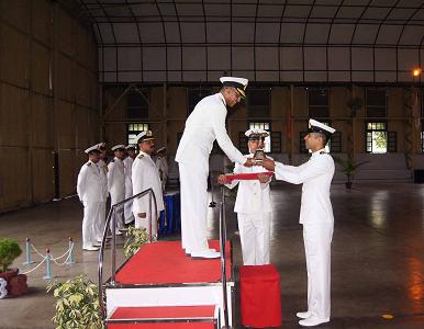 Lt Sheshnath Mishra receiving the Director General Coast Guard Trophy for the best All Rounder from Rear Admiral Madhusudanan