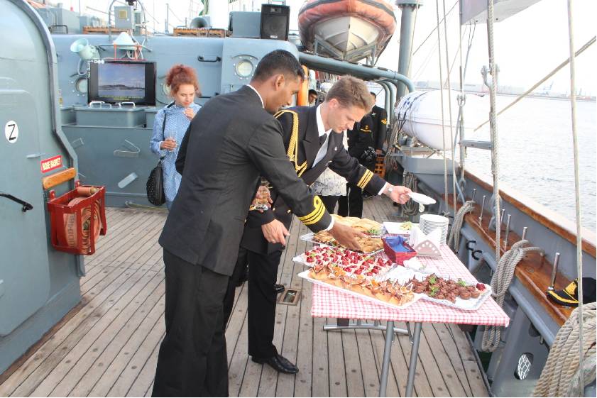Guests Relishing Various Delicacies on Board