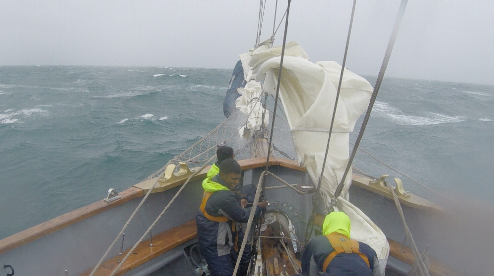 Furling the Jibs and Setting Storm Sails