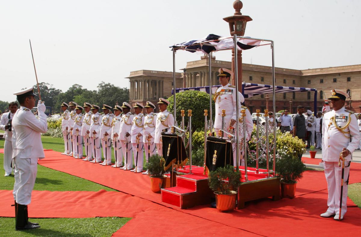 Admiral RK Dhowan takes salute after taking over as new Chief of Naval Staff at New Delhi